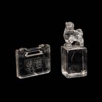A Chinese Rock Crystal Seal and A Rock Crystal Lock-Form Pendant, 19th-20th Century — 晚清-民國 水晶長命鎖及獅鈕方章