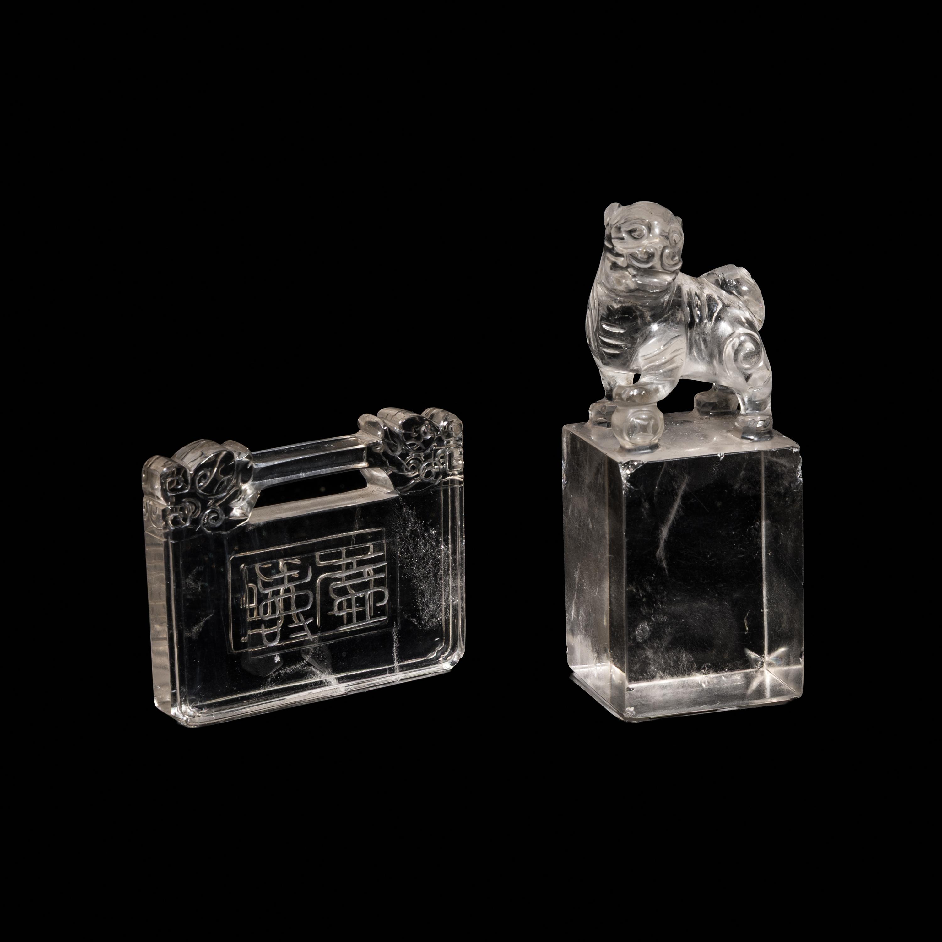 A Chinese Rock Crystal Seal and A Rock Crystal Lock-Form Pendant, 19th-20th Century — 晚清-民國 水晶長命鎖及獅鈕方章