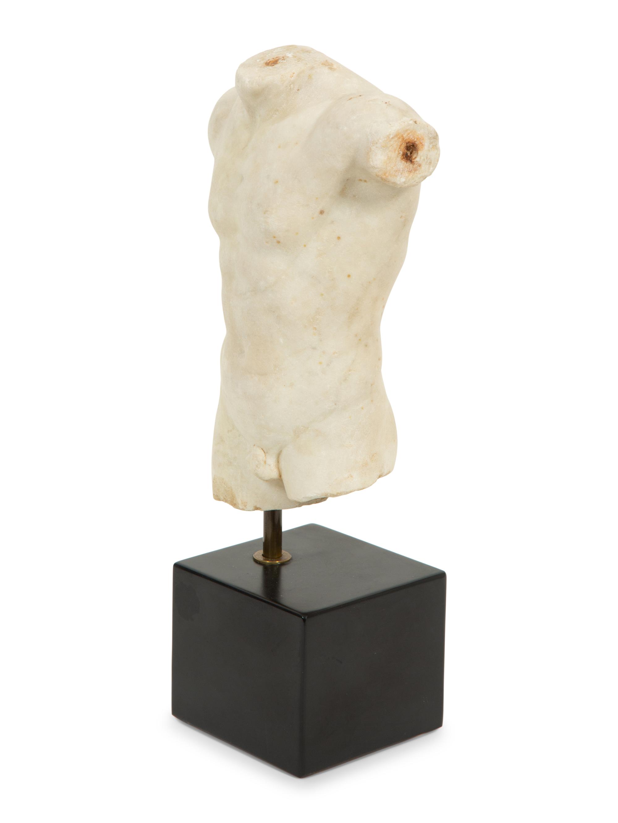 A Continental Carved Marble Male Torso