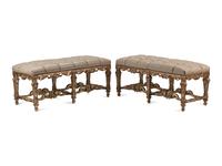 A Pair of Regence Style Leather Upholstered Silvered and Giltwood Benches