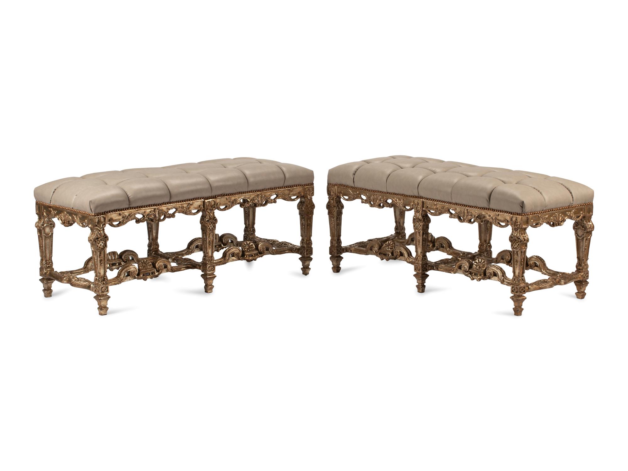 A Pair of Regence Style Leather Upholstered Silvered and Giltwood Benches