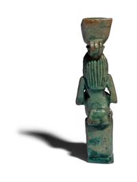 An Egyptian Faience Isis Nursing Horus Amulet