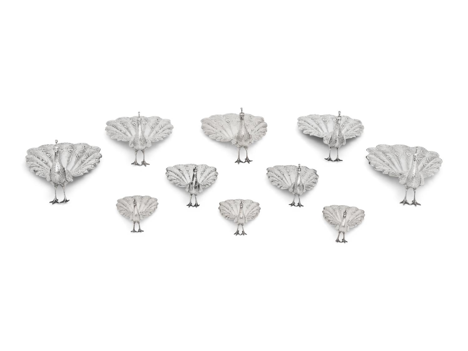 A Collection of Ten American Silver Peacock Table Ornaments