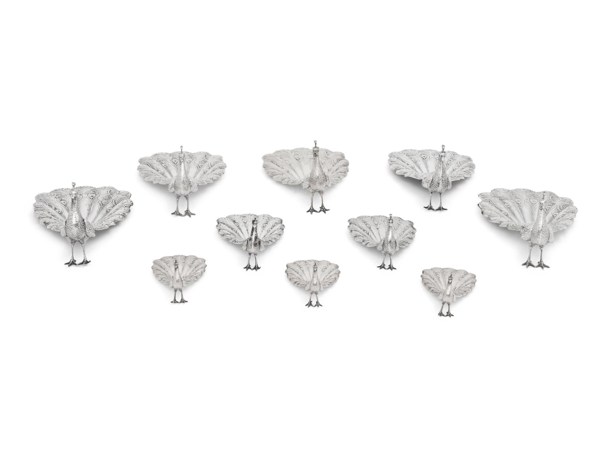 A Collection of Ten American Silver Peacock Table Ornaments