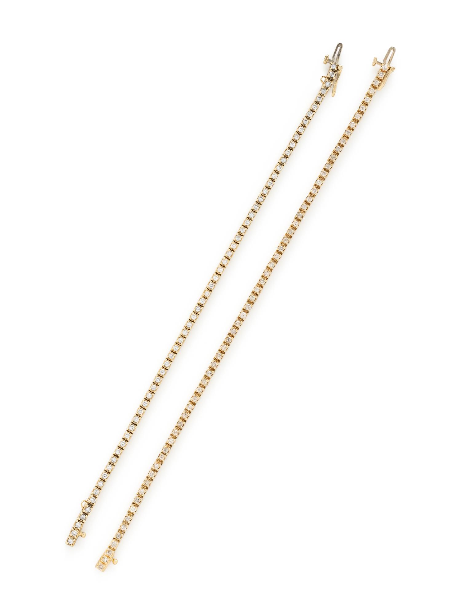 PAIR OF YELLOW GOLD AND DIAMOND LINE BRACELETS