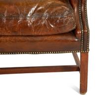 A George III Style Leather Wingback Armchair