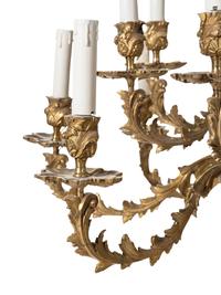 A Louis XV Style Gilt Bronze Sixteen-Light Chandelier