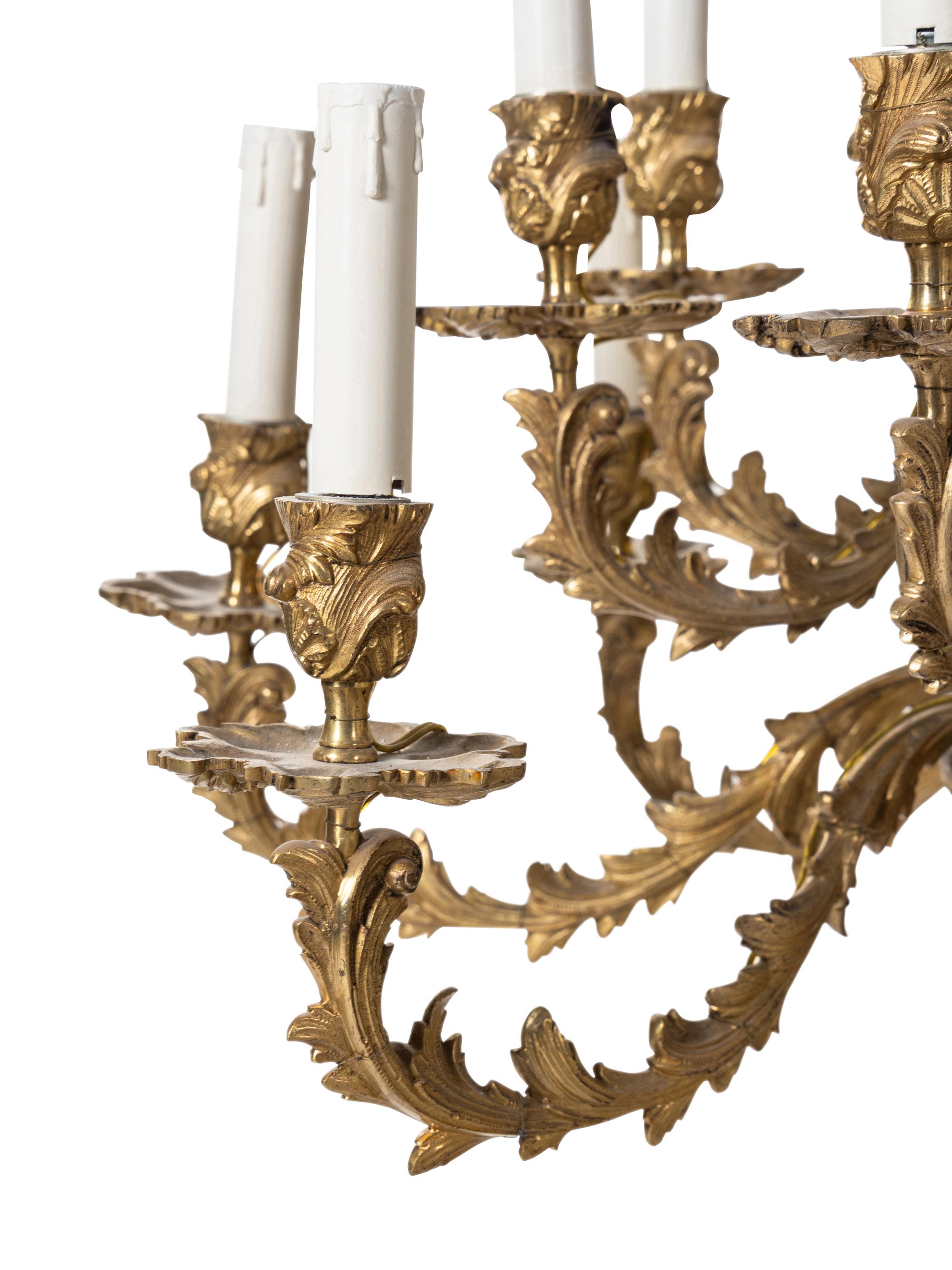 A Louis XV Style Gilt Bronze Sixteen-Light Chandelier