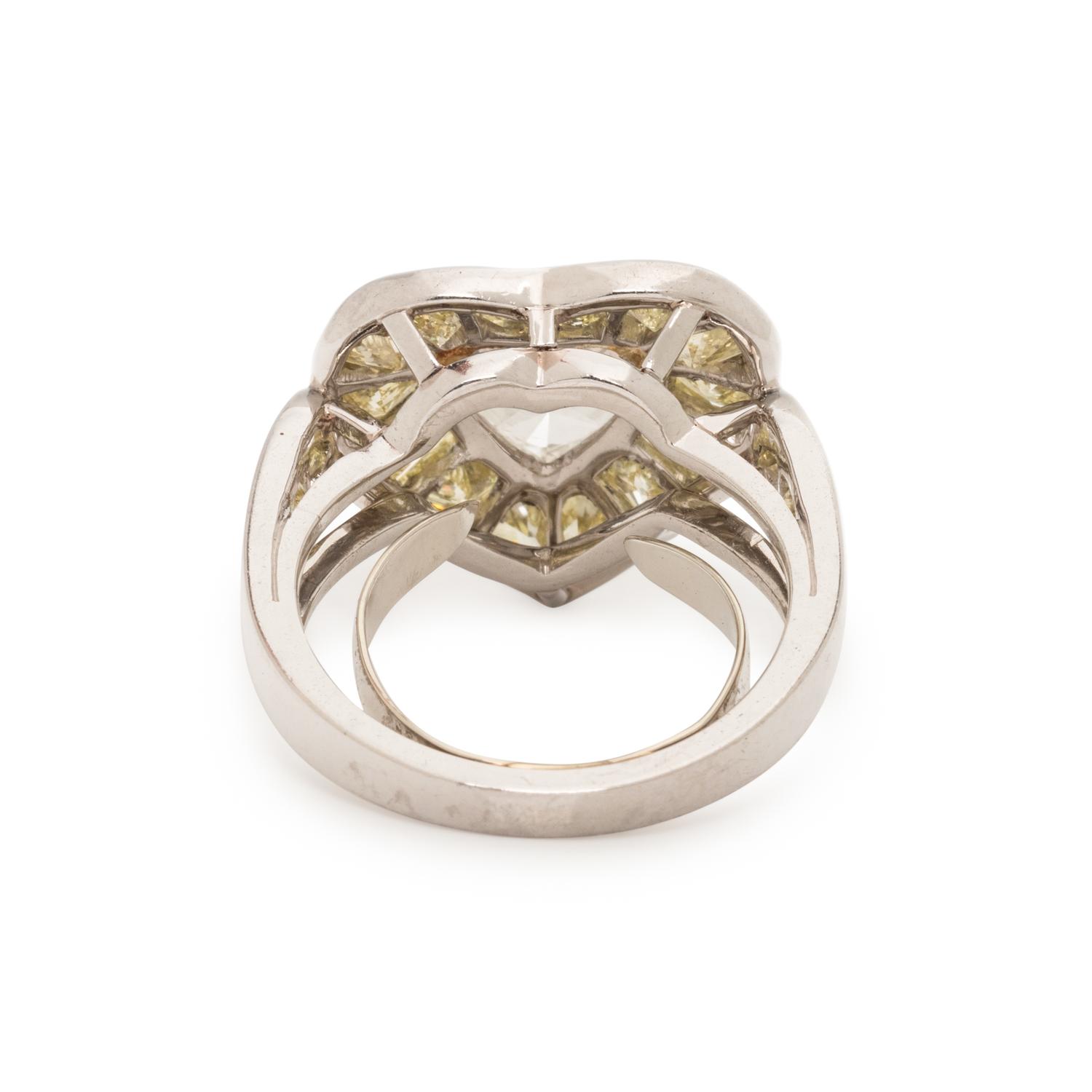 OSCAR HEYMAN, HEART SHAPED DIAMOND AND YELLOW DIAMOND RING