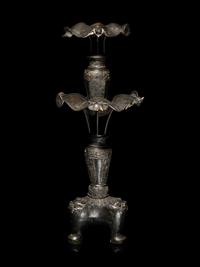 A Large Pair of Bronze Candle Holders