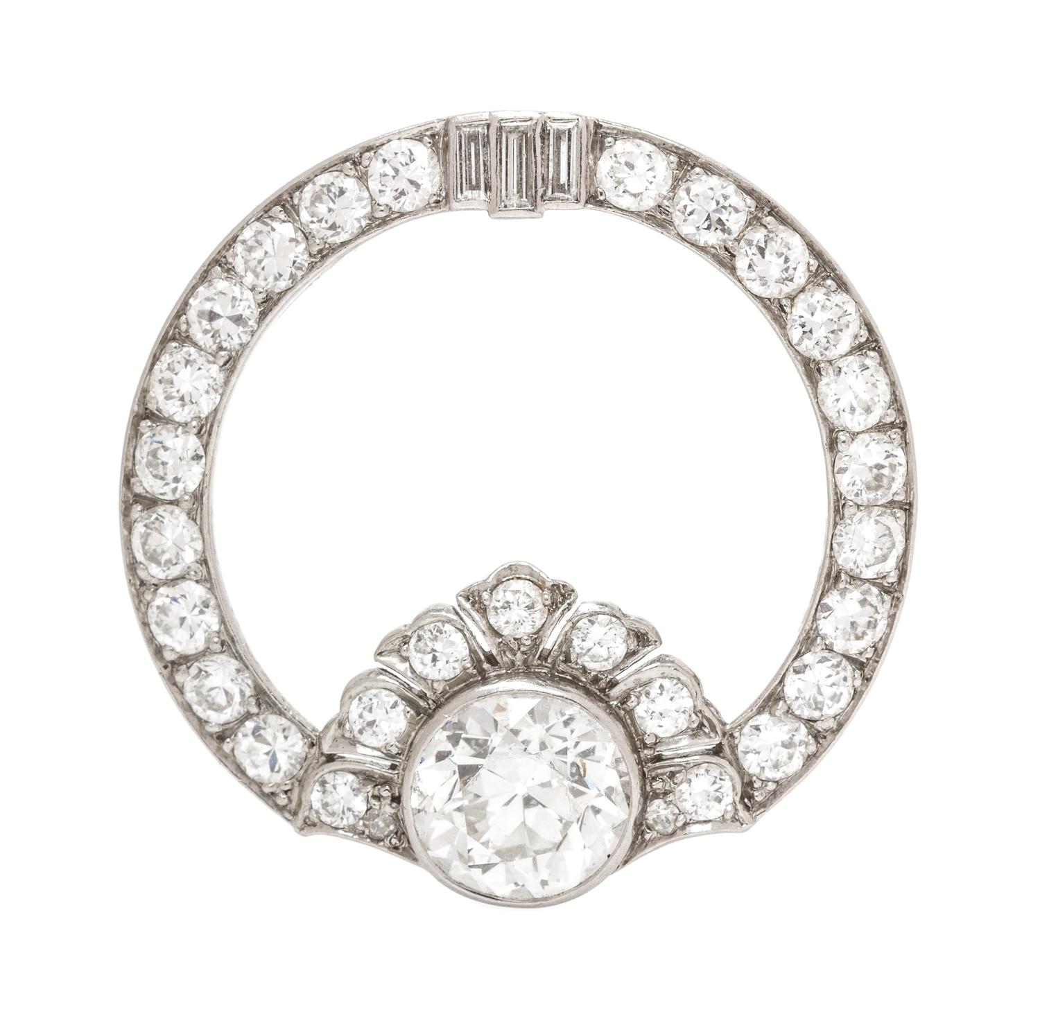A Platinum and Diamond Circular Brooch, 3.70 dwts.