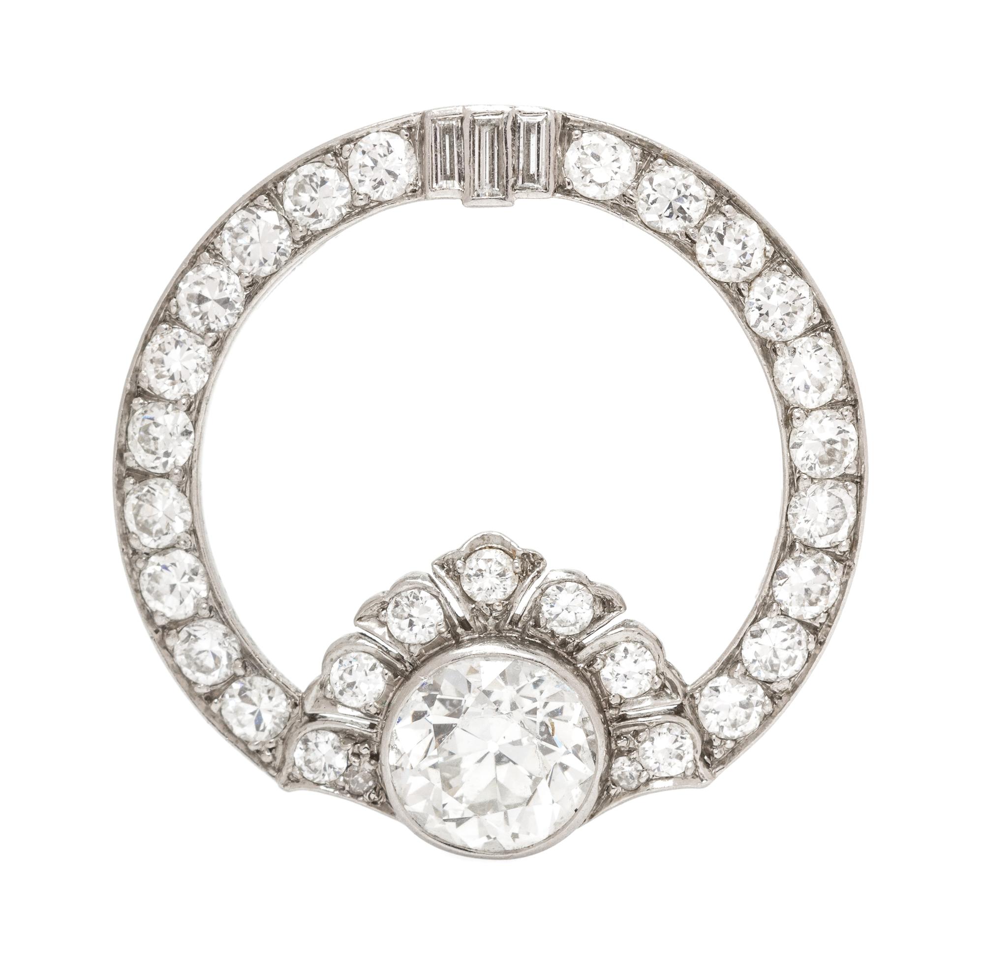 A Platinum and Diamond Circular Brooch, 3.70 dwts.