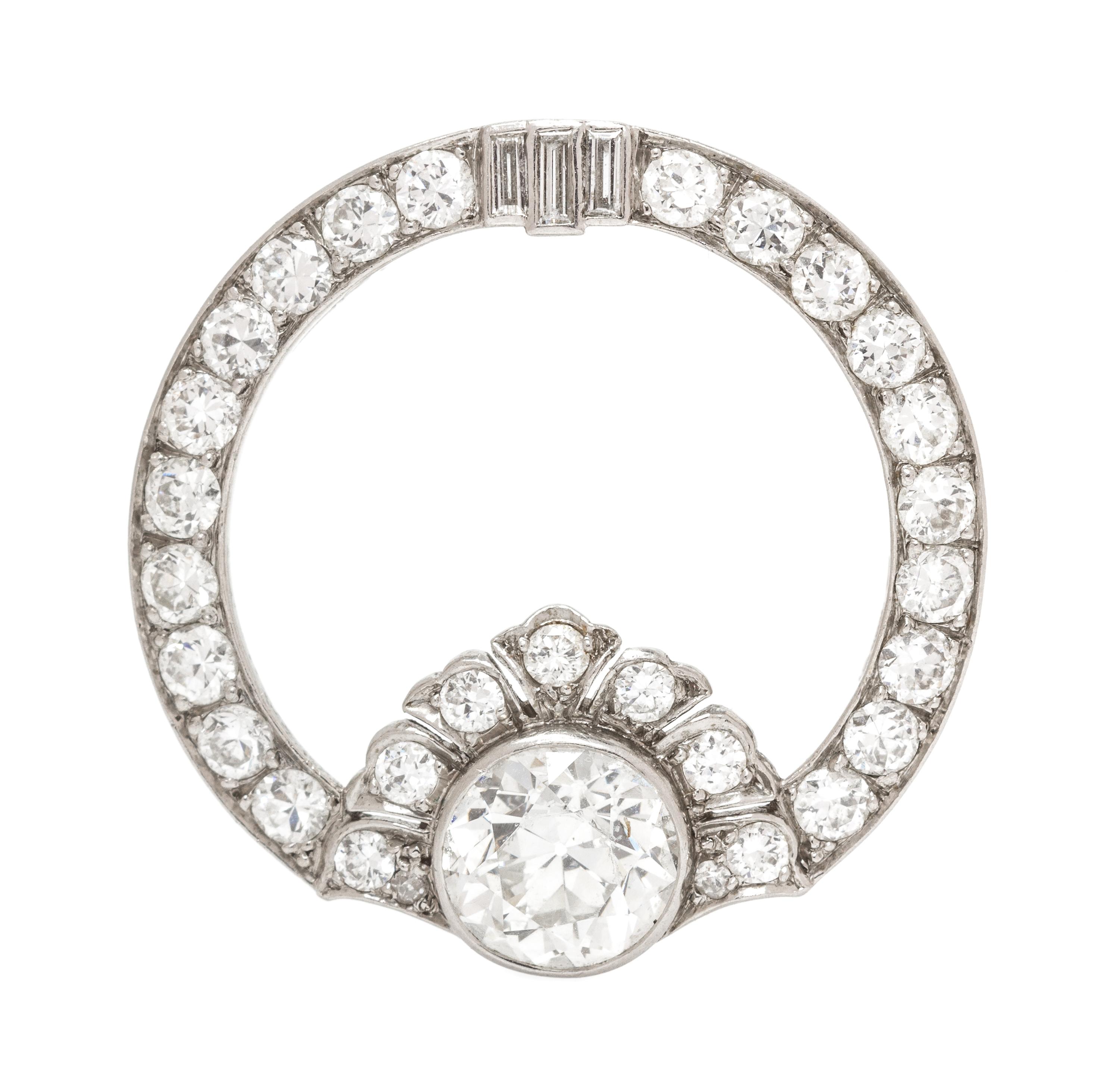 A Platinum and Diamond Circular Brooch, 3.70 dwts.