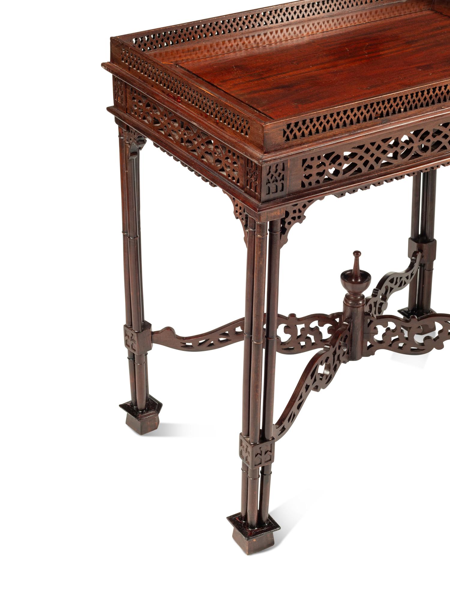 A Pair of George III Style Mahogany Tea Tables