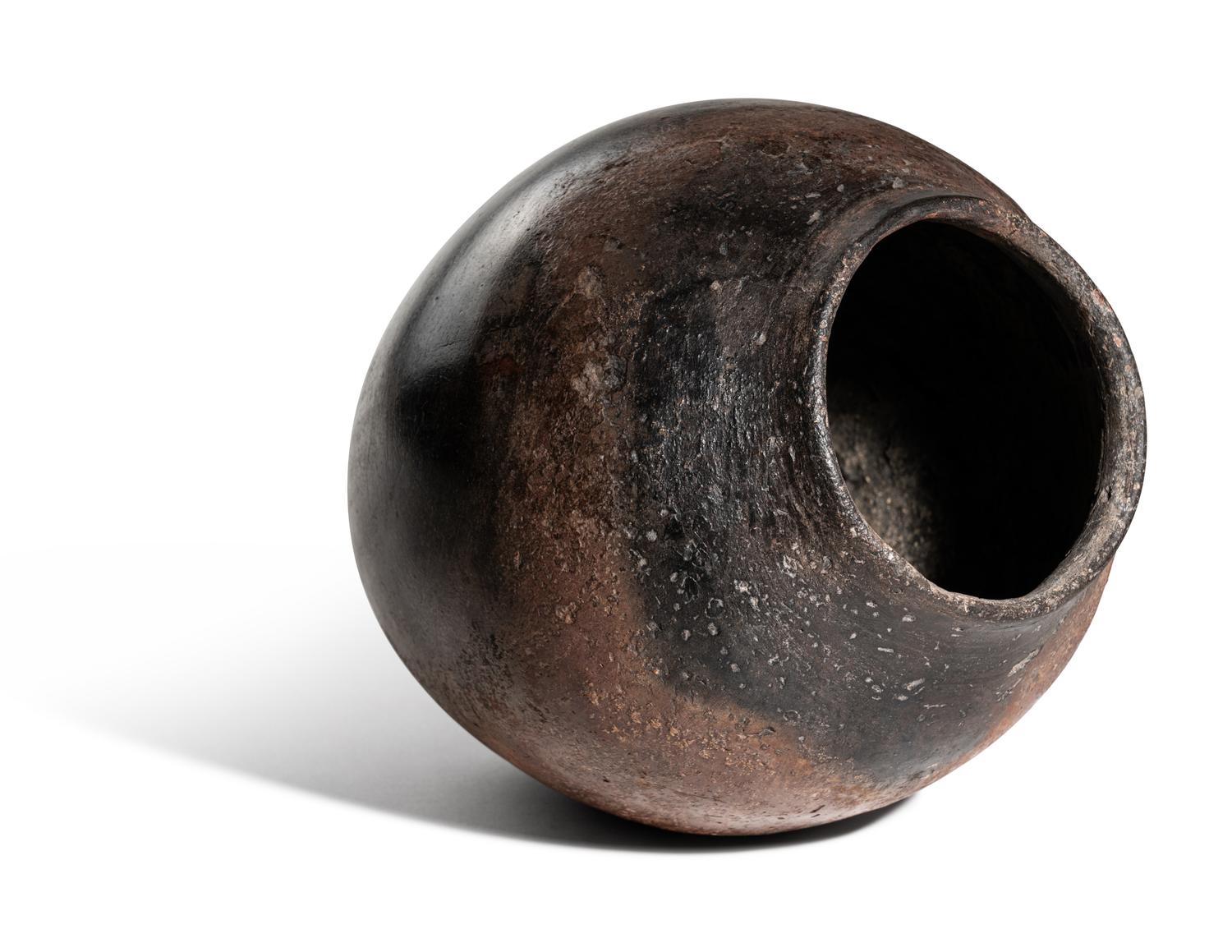 An Egyptian Black-Topped Pottery Jar