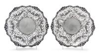 A Pair of Continental Silver Bowls, Maker's Mark HSS centering a star, each having pierced sides decorated with foliate scrolls, fruit