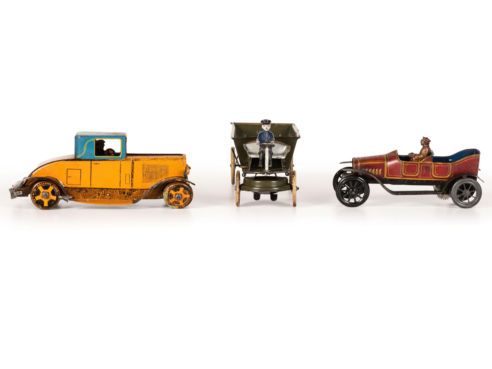 Three Painted Tin Vehicles