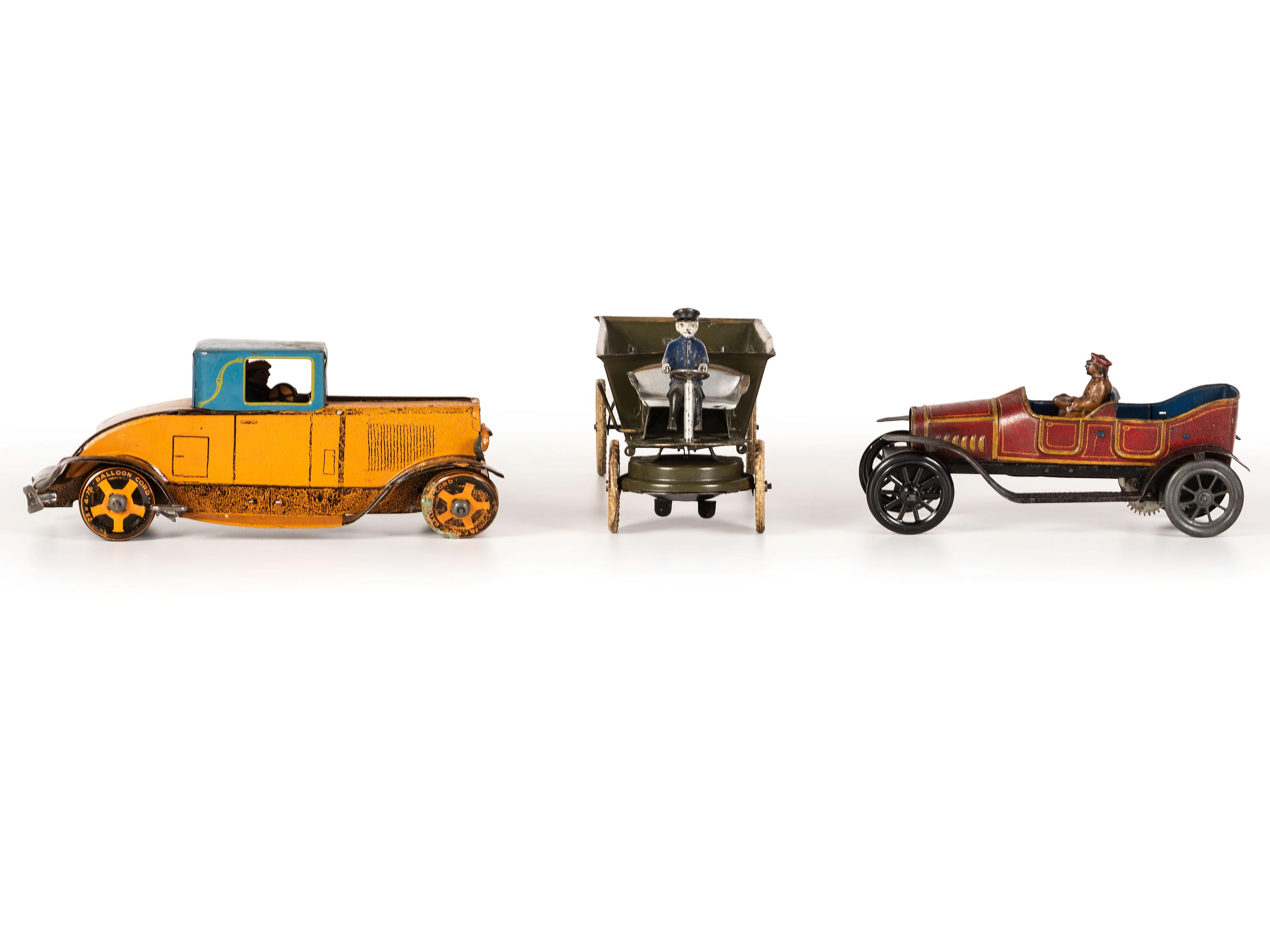 Three Painted Tin Vehicles