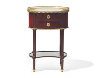 A Louis XVI gilt-bronze mounted fruitwood table en chiffonière with white marble top, circa 1790