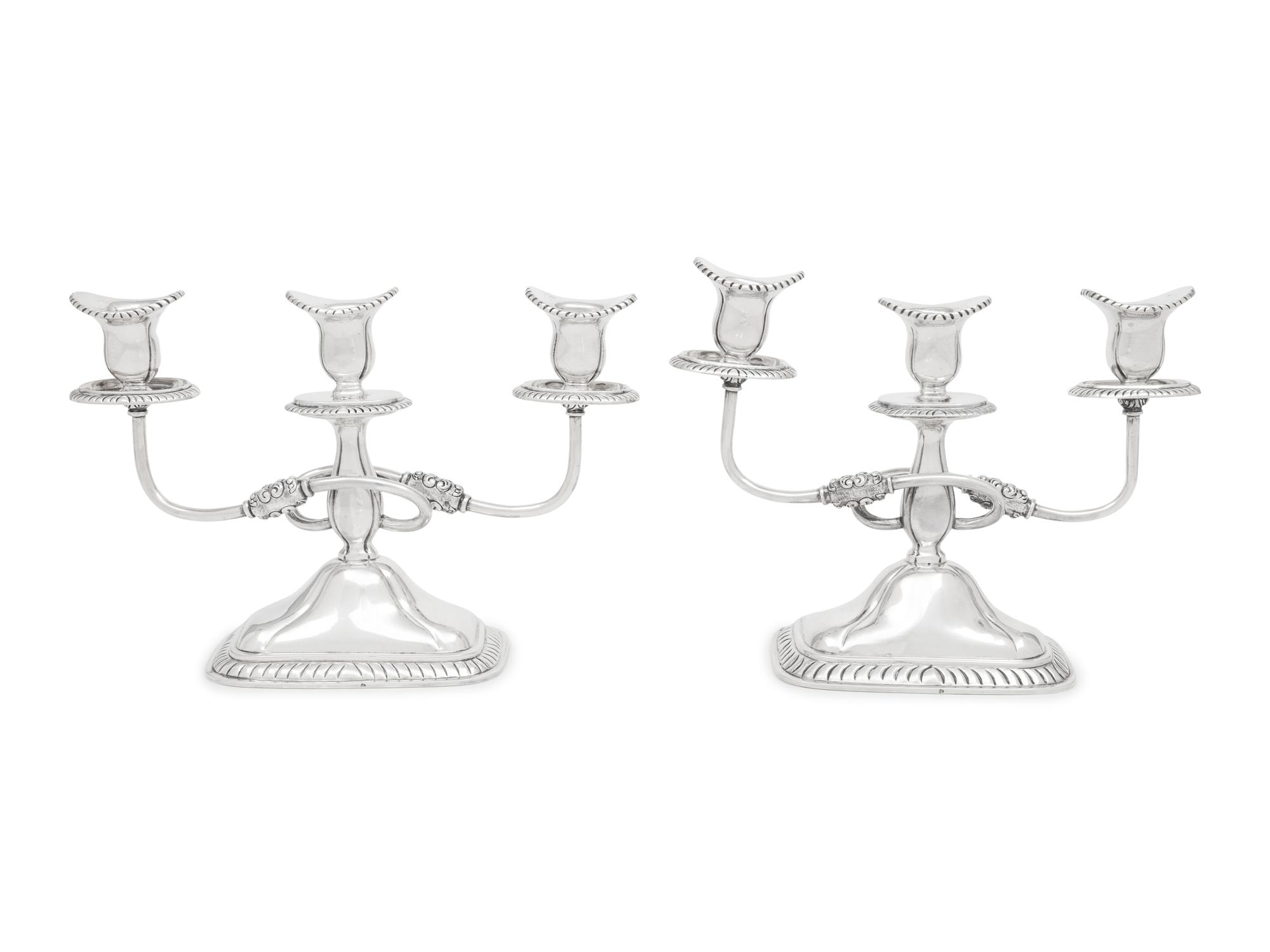A Pair of Sanborns Silver Three-Light Candelabra