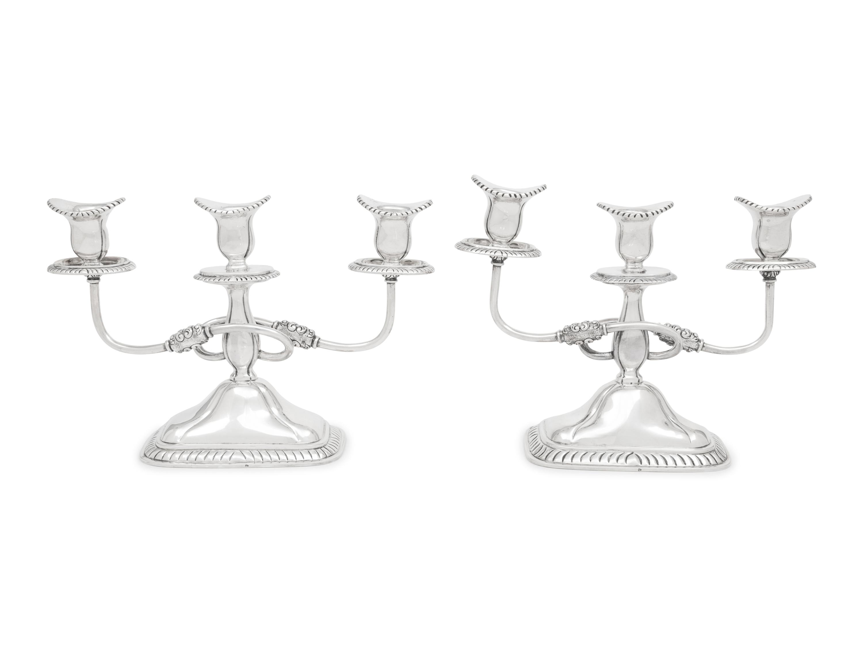 A Pair of Sanborns Silver Three-Light Candelabra