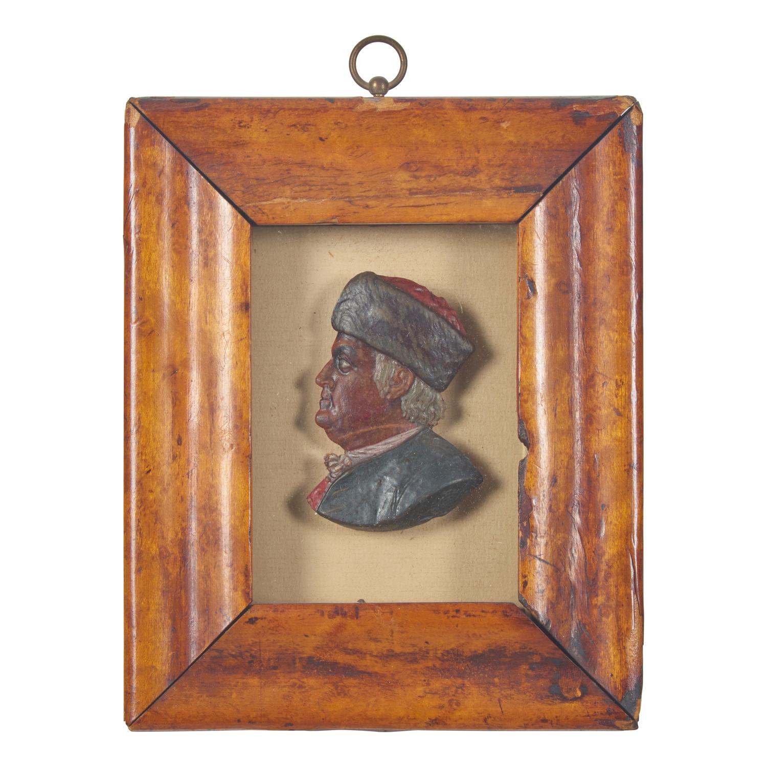American School 19th Century, A Colored Wax Profile Portrait Bust of Benjamin Franklin with Fur Hat