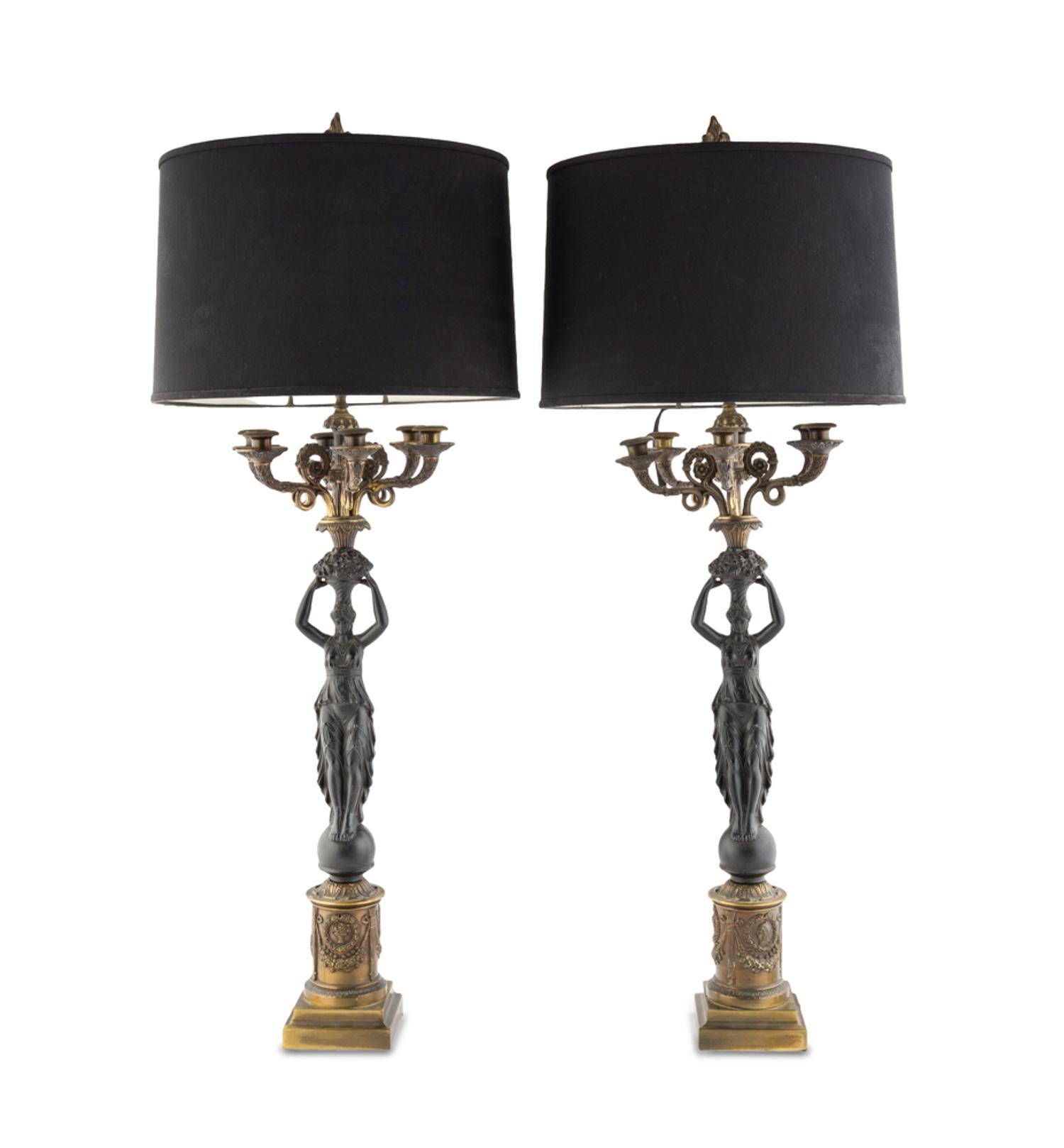 A Pair of Empire Style Parcel Gilt and Patinated Metal Six-Light Candelabra