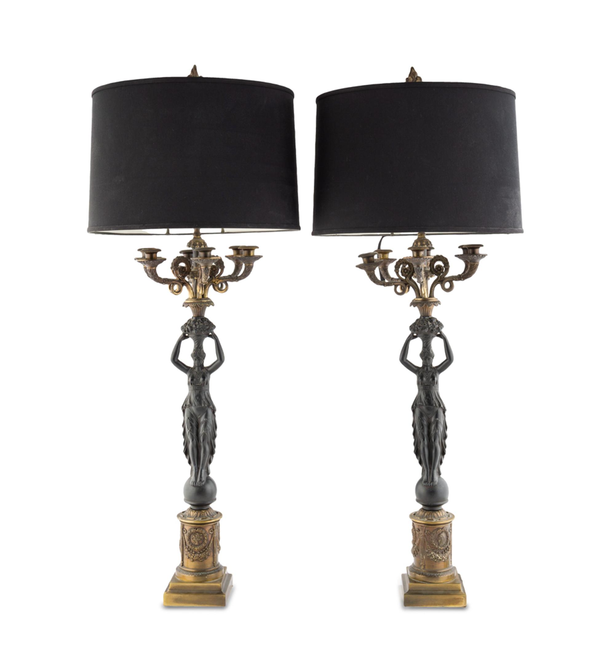 A Pair of Empire Style Parcel Gilt and Patinated Metal Six-Light Candelabra