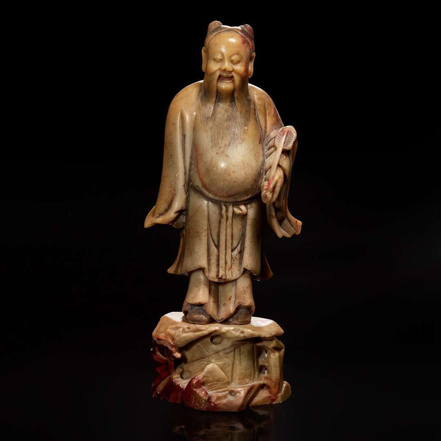 A Chinese carved beige soapstone figure of the Daoist immortal Zhongli Quan 壽山石雕鐘離權 Qing dynasty ?