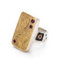 An 18 Karat Yellow Gold, Sterling Silver and Ruby Ring, 12.00 dwts.