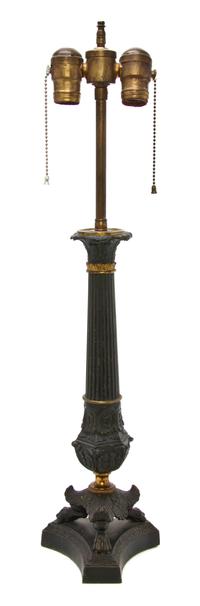 A Neoclassical Gilt and Patinated Cast Metal Table Lamp, Height overall 25 1/2 inches.