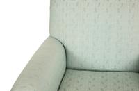 A Pale Blue Upholstered Club Chair with Matching Ottoman