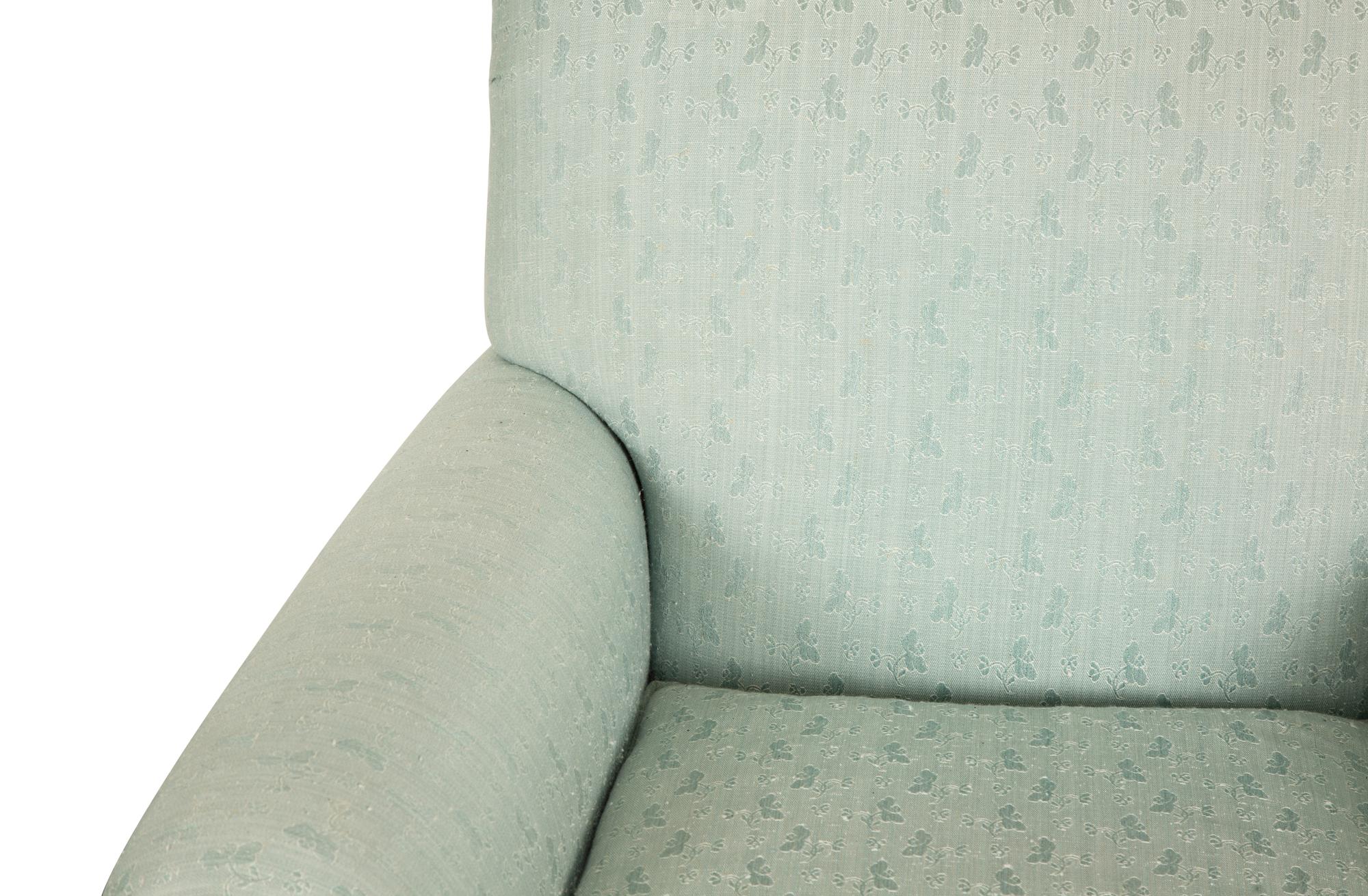 A Pale Blue Upholstered Club Chair with Matching Ottoman