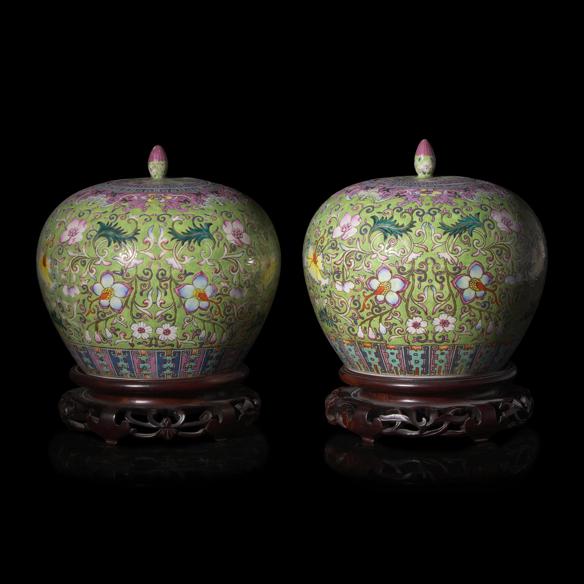 A Pair of Chinese Famille Rose Green Ground Covered Jars — 粉彩蘋果綠地纏枝花卉紋蓋罐一對