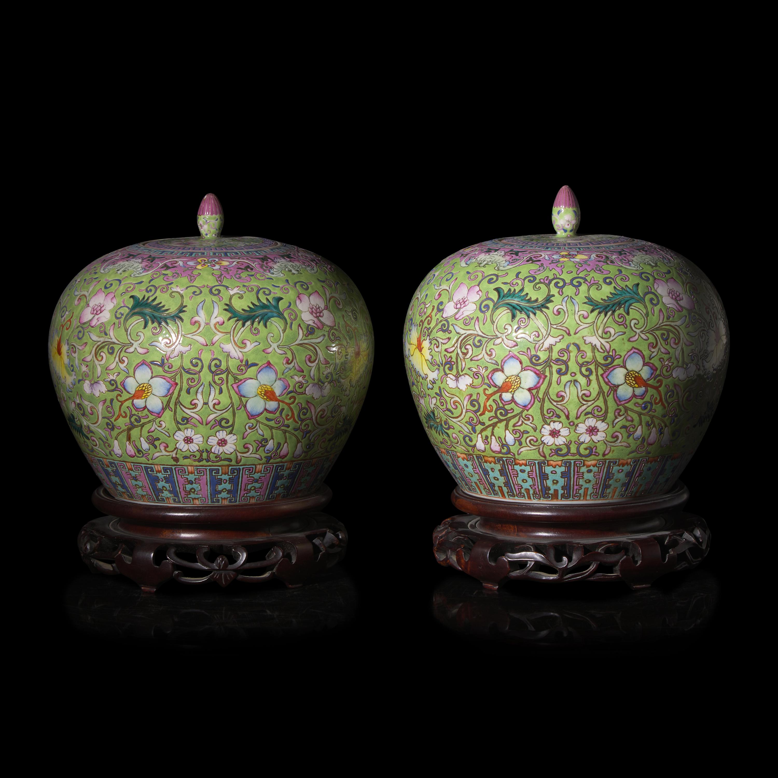 A Pair of Chinese Famille Rose Green Ground Covered Jars — 粉彩蘋果綠地纏枝花卉紋蓋罐一對