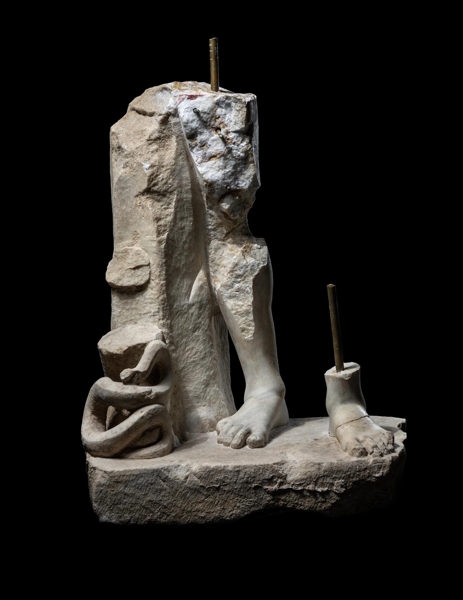 A Roman Marble Base Fragment, Possibly of Apollo or Asklepios