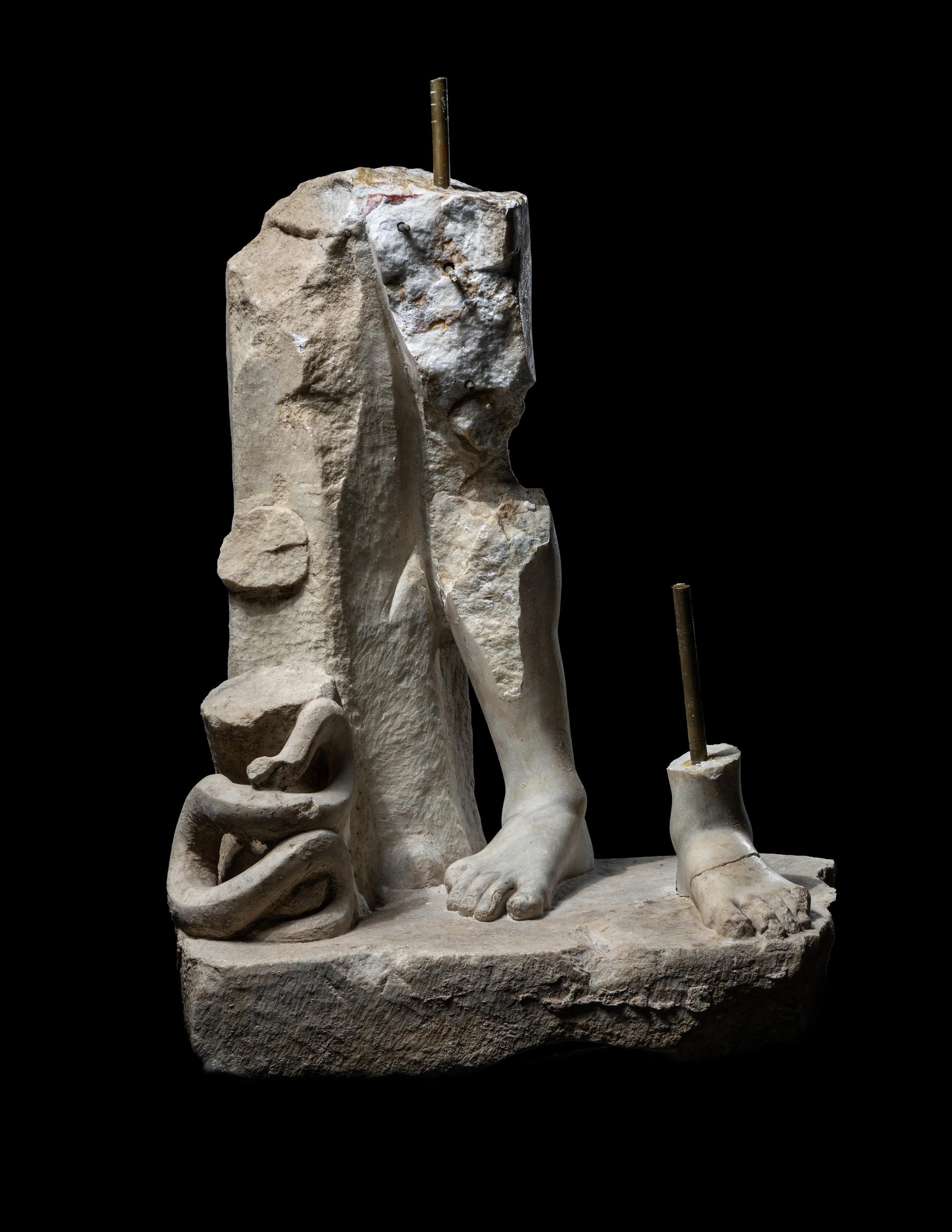 A Roman Marble Base Fragment, Possibly of Apollo or Asklepios