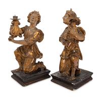 A Pair of Continental Giltwood Figural Altar Candlesticks