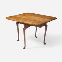 A Queen Anne tiger maple drop leaf table New England, 18th century