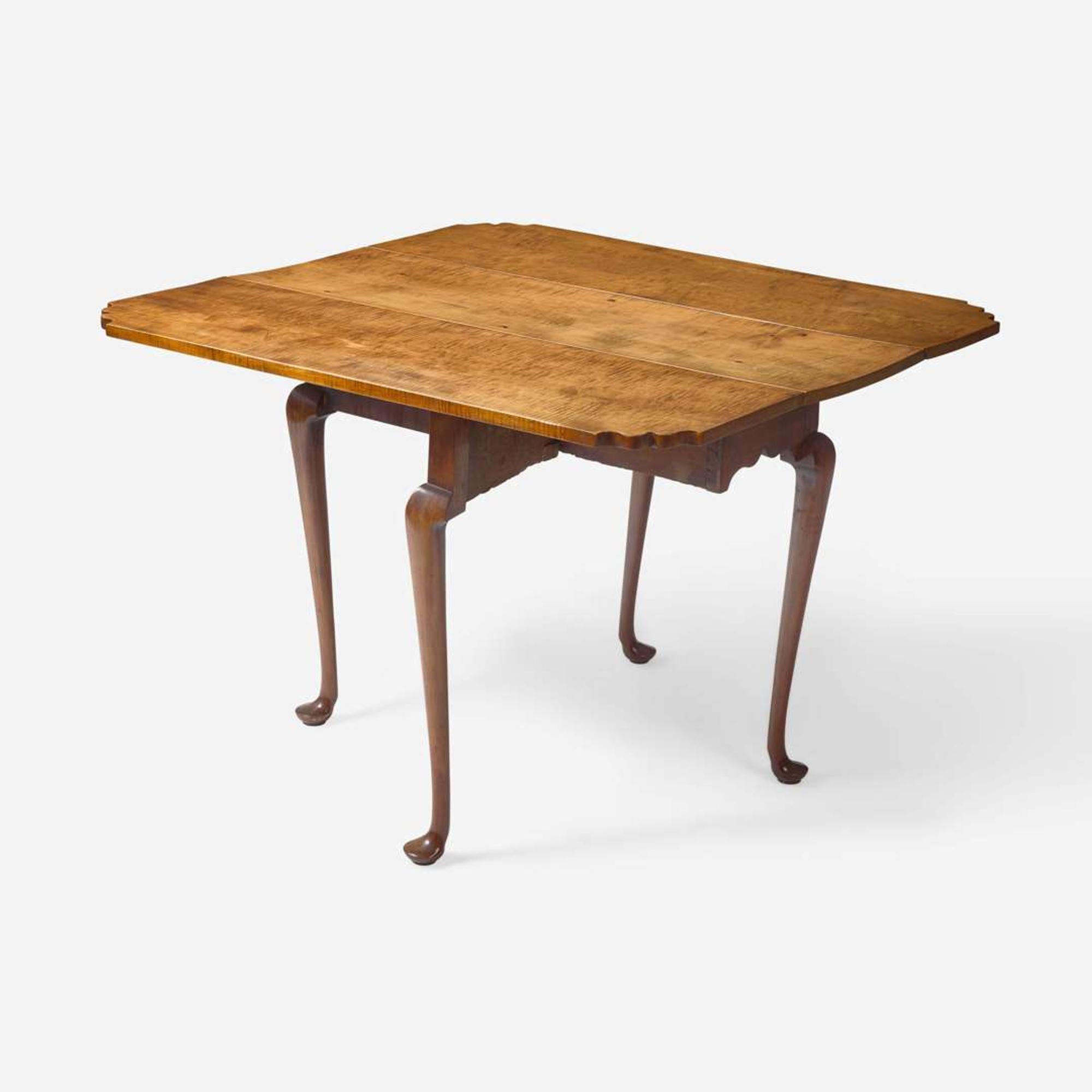 A Queen Anne tiger maple drop leaf table New England, 18th century