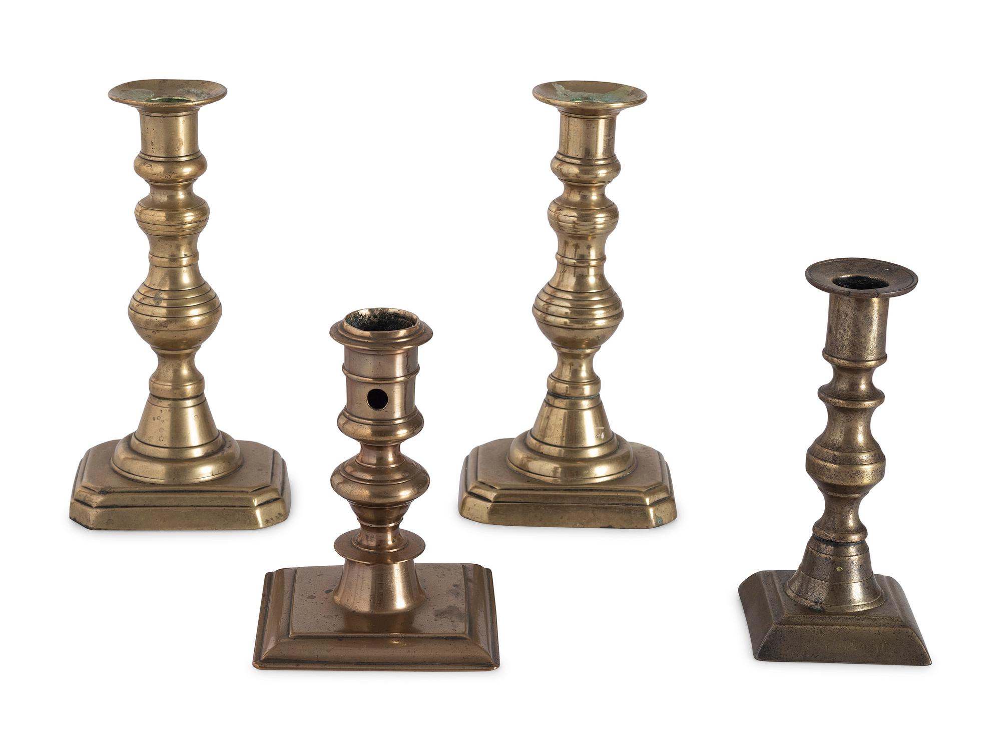 Sixteen English Brass Candlesticks