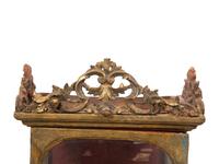 An Italian Carved Giltwood Reliquary Cabinet