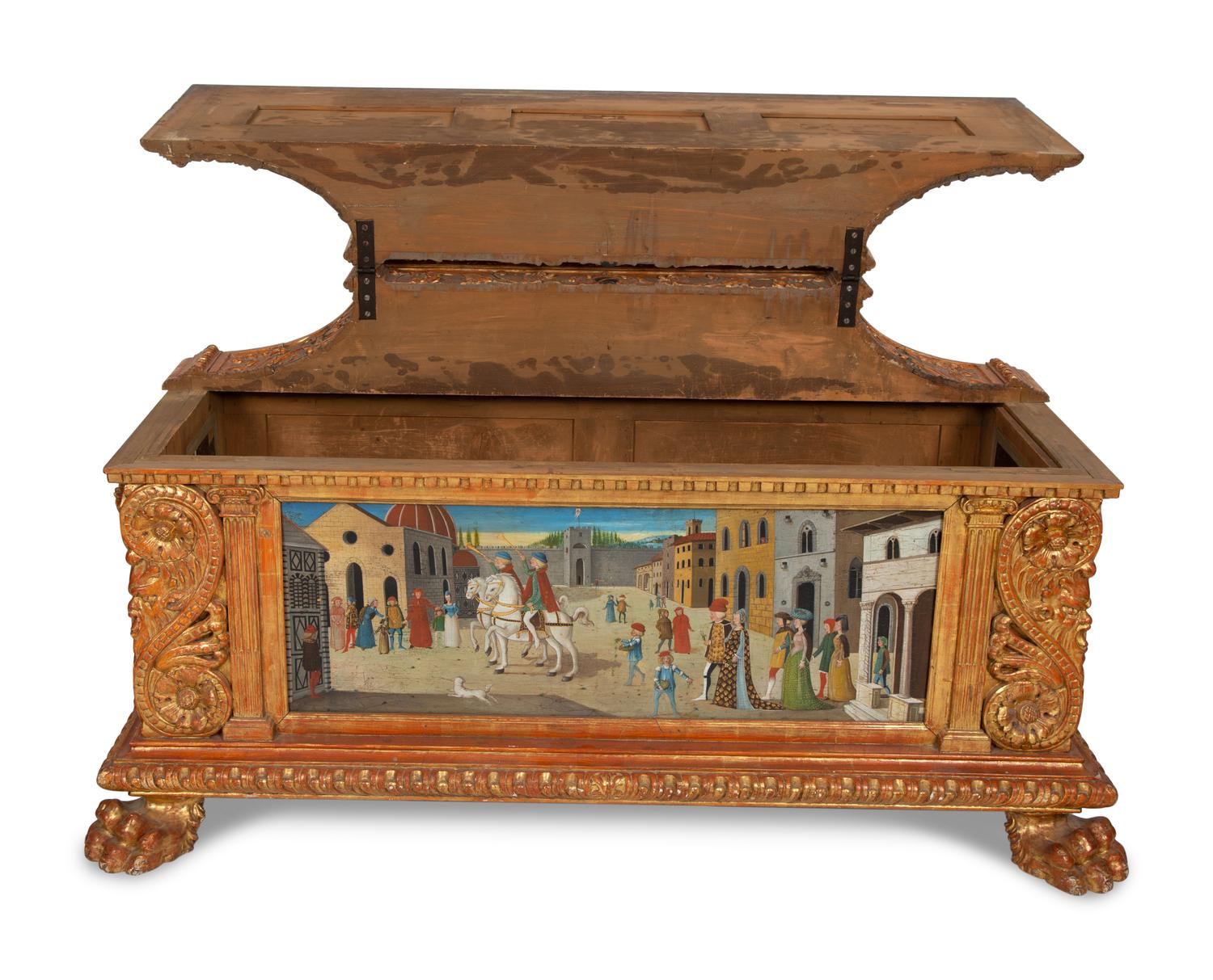 An Italian Renaissance Style Carved, Painted and Parcel Gilt Cassone