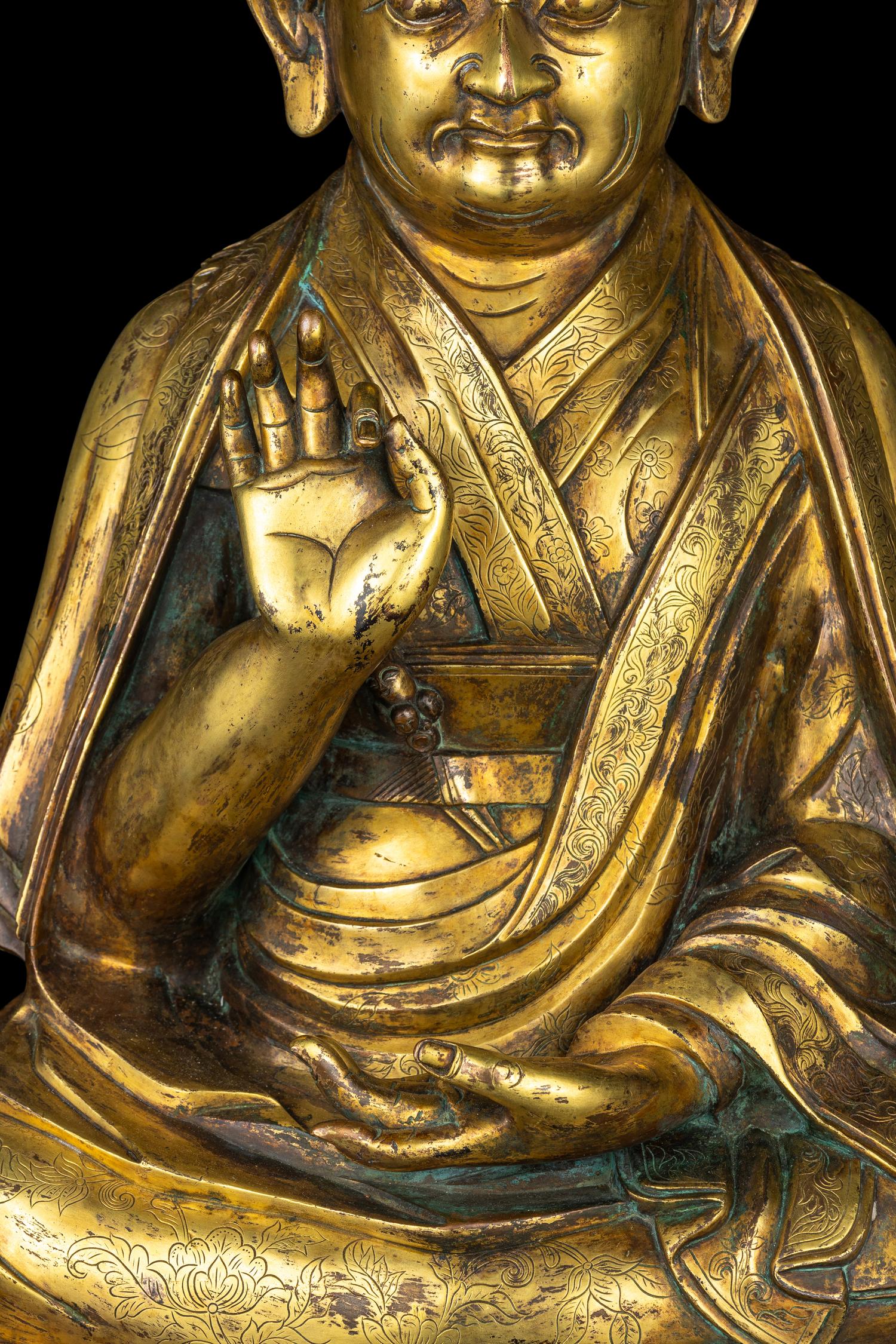 A Large Sino-Tibetan Gilt Bronze Figure of a Lama 巨型銅鎏金上師坐像