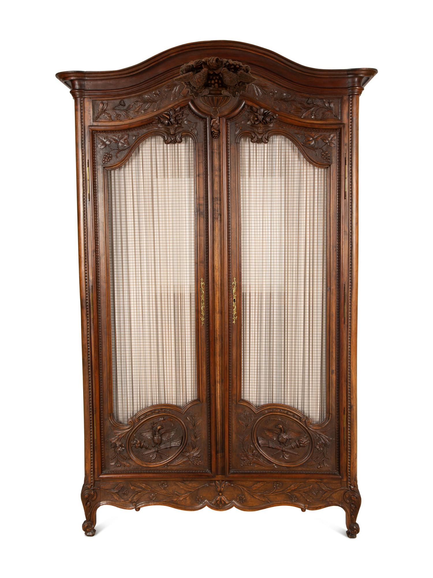 A Louis XV Provincial Style Mahogany Armoire