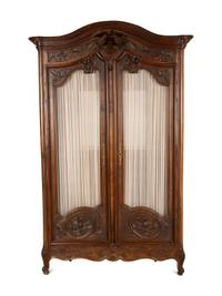 A Louis XV Provincial Style Mahogany Armoire