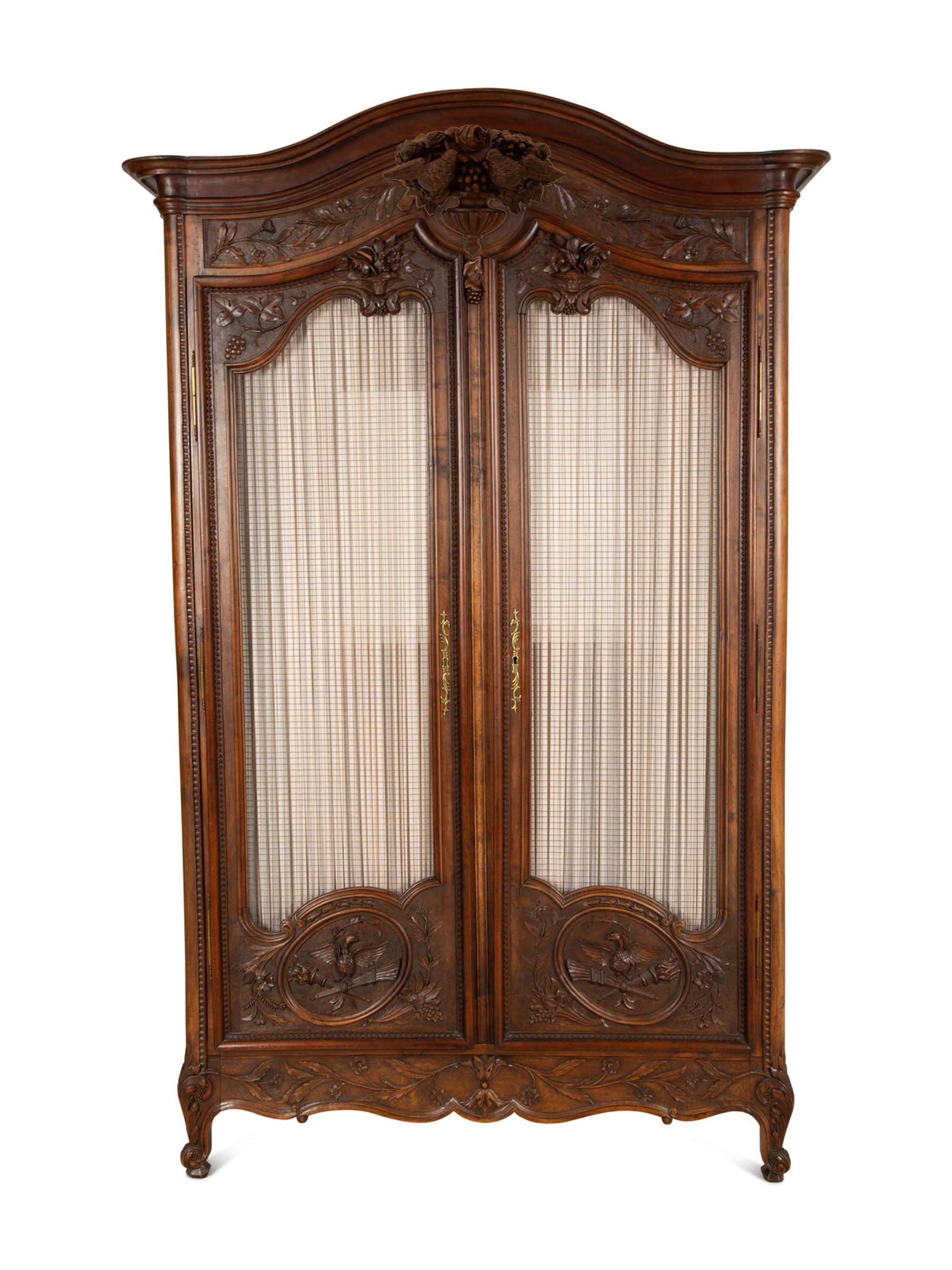 A Louis XV Provincial Style Mahogany Armoire