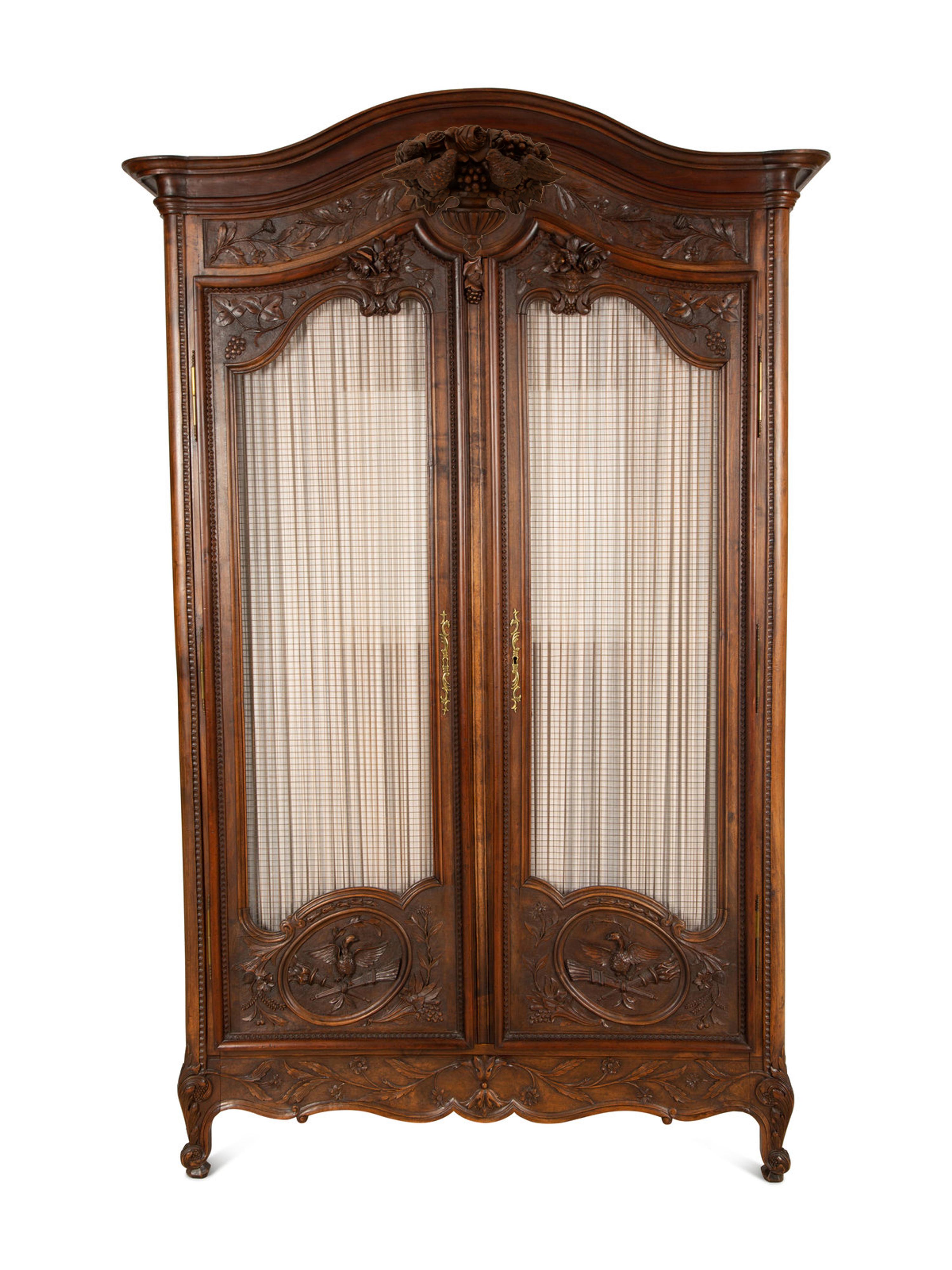 A Louis XV Provincial Style Mahogany Armoire