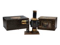 [EARLY PHOTOGRAPHY]. Magic Lantern projector in original box with matching box used to store slides.
