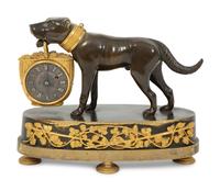 A Small French Gilt and Patinated Bronze Dog Clock